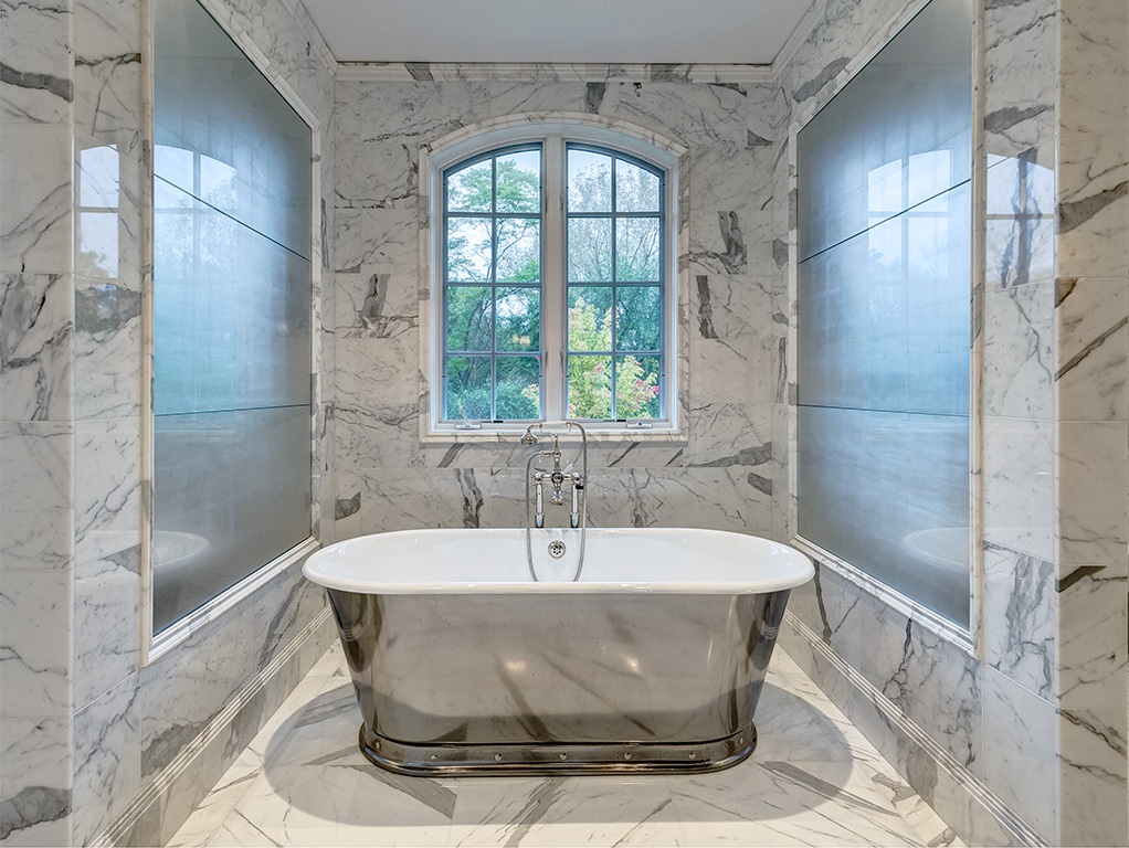 master bath with marble