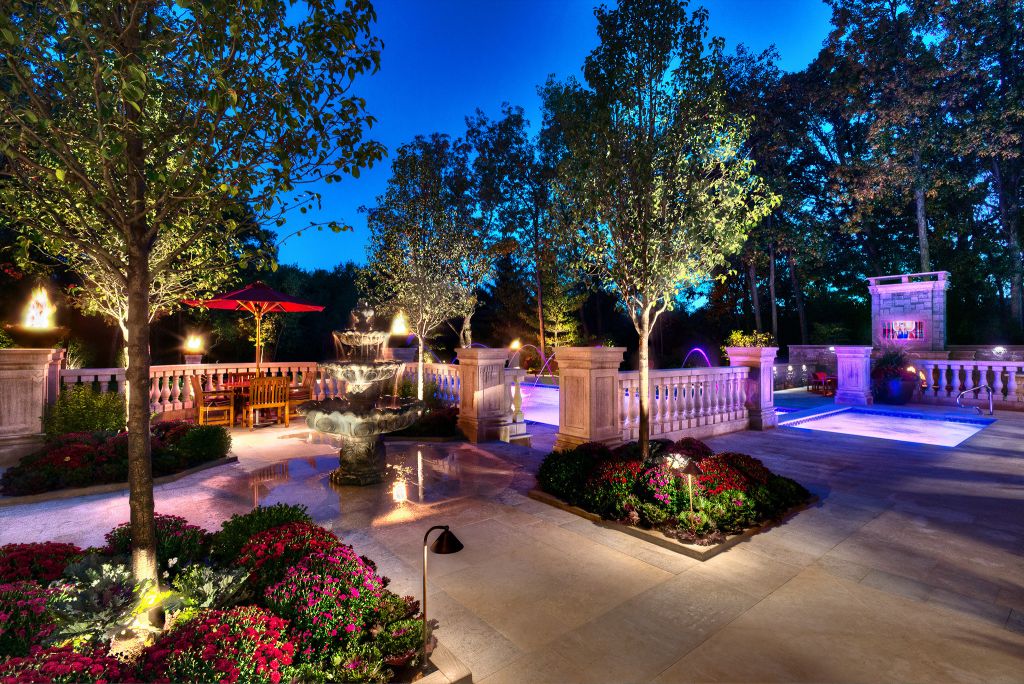 lighted landscaping at dusk 