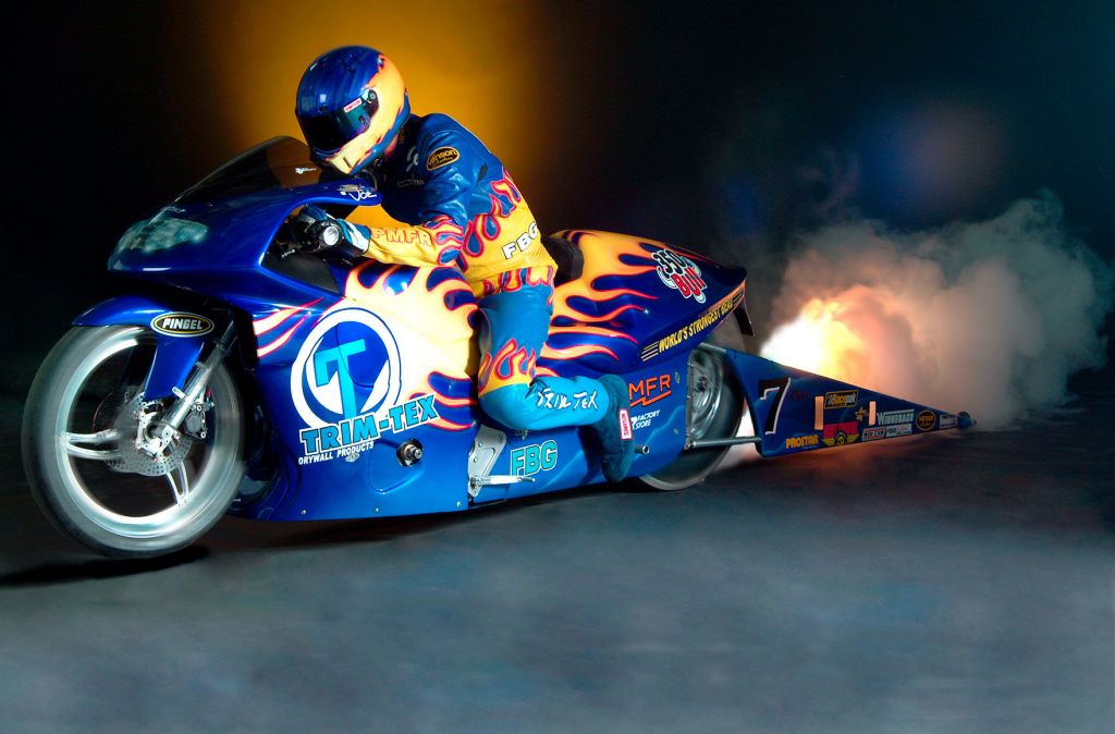 studio shot of joe koenig with trim-tex racing motorcycle